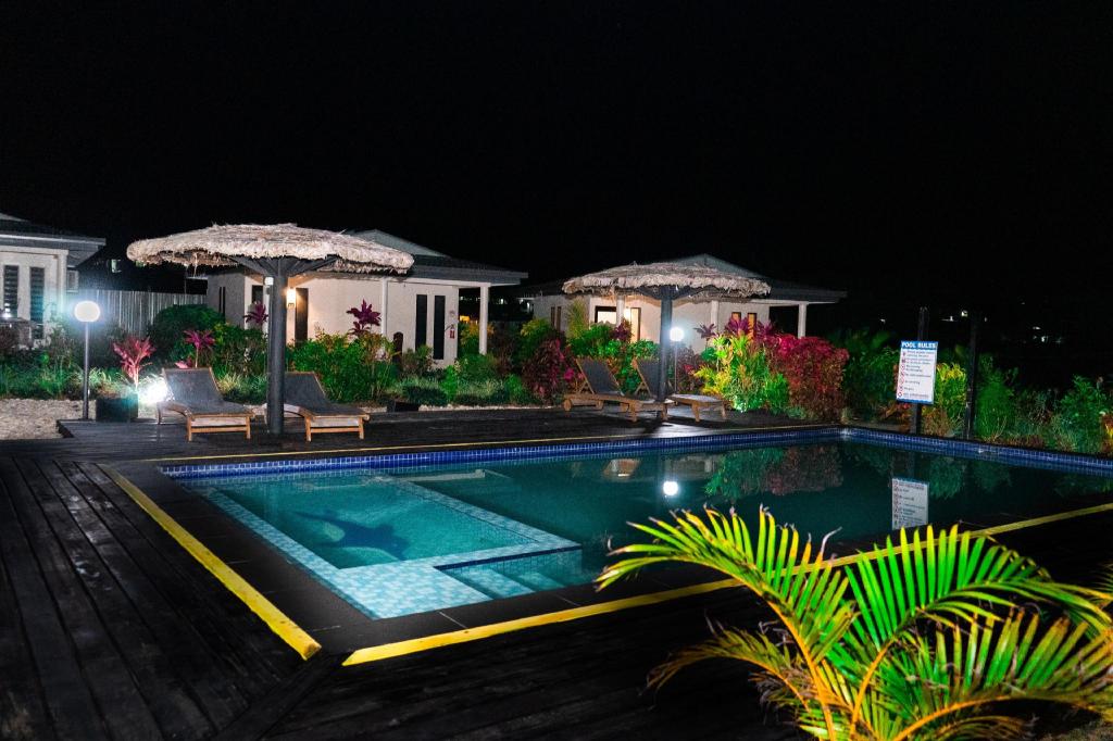 Bulabard Villas — the outdoor pool among tropical gardens